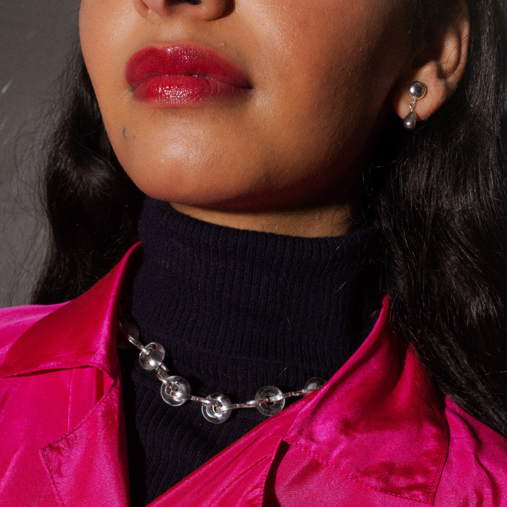 Quartz Poise Collar Necklace by jewellery brand Skomer Studio worn by model with the Teardrop Stud Earrings in sterling silver